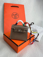 HERMES Kelly Bag Charm Etoupe PHW | 愛馬仕 Kelly手袋吊飾 (大象灰/銀扣) - LondonKelly 英國名牌代購